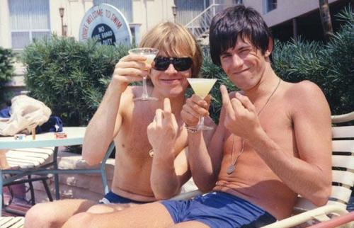  rolling stones keith richards brian jones in swimming pool sticky the middle finger