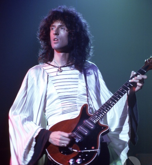 young brian may from queen with his special guitar