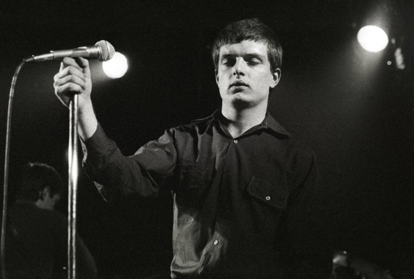 ian curtis eyes closed live on stage