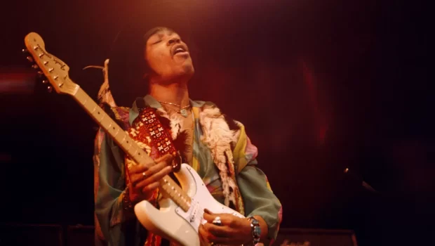 Jimi Hendrix playing his beloved white Fender Stratocaster