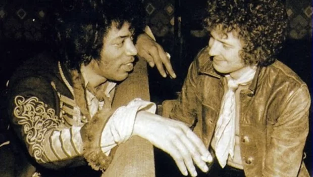 Jimi Hendrix and Eric Clapton admiration in one picture