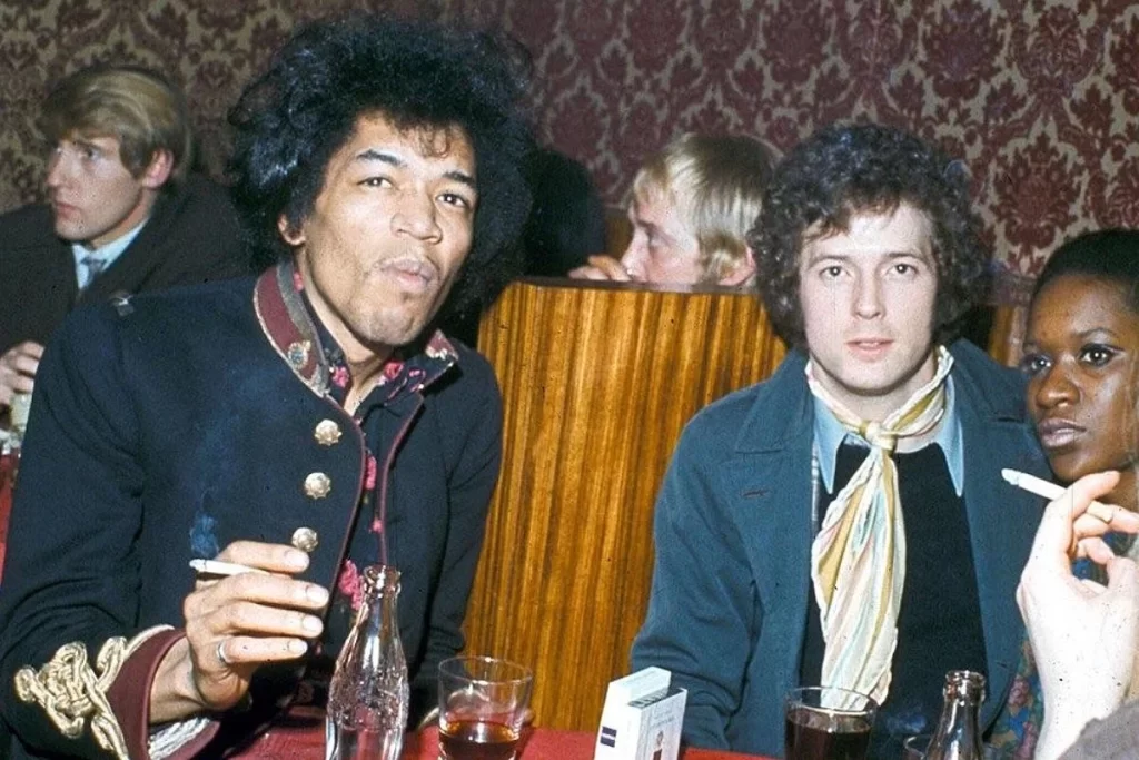 Two Guitar Gods: Jimi Hendrix and Eric Clapton, having a good time.