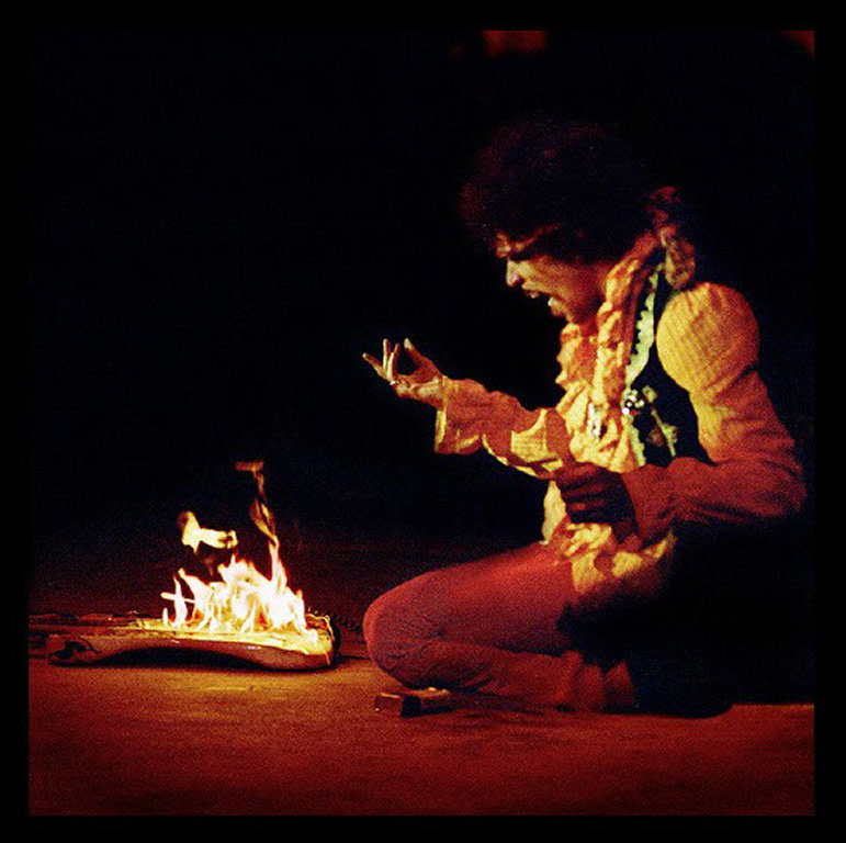 Jimi Hendrix sets his guitar ablaze at the 1967 Monterey Pop Festival.