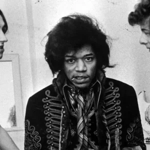 Jimi Hendrix backstage at Bath Pavilion in February 1967 with band members Mitch Mitchell and Noel Redding.