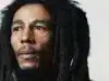 A close-up image of Bob Marley with a focused expression